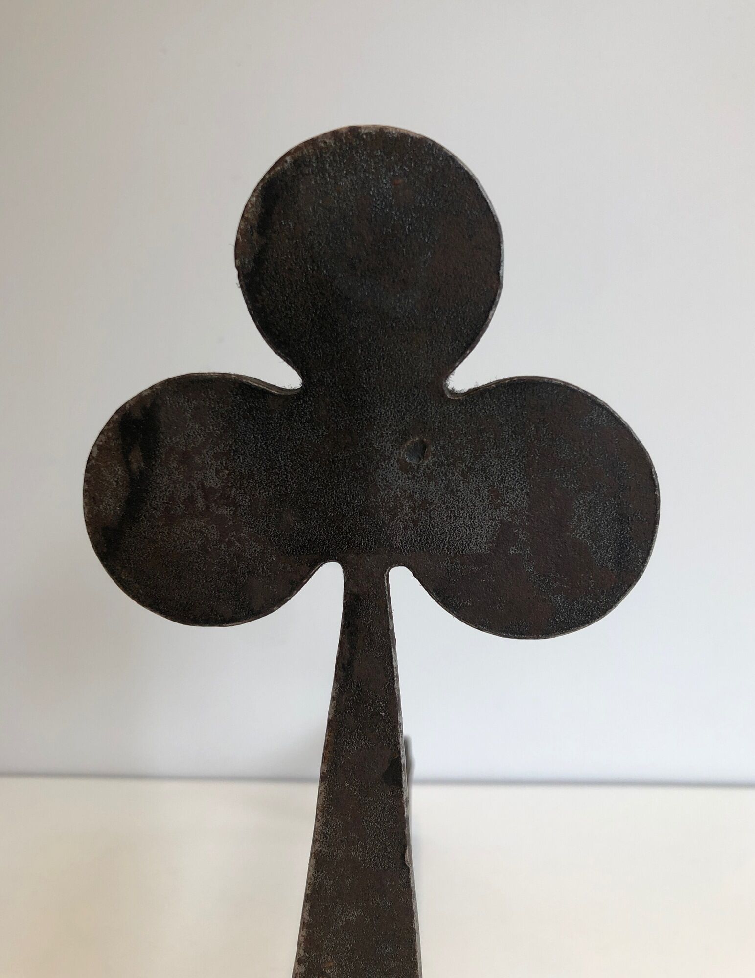 Pair of wrought steel and iron chenets with clover decorations 1950