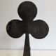 Pair of wrought steel and iron chenets with clover decorations 1950