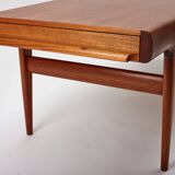 Extendable coffee table designed by Johannes Andersen for Uldum Møbelfabrik, Denmark, 1960s.