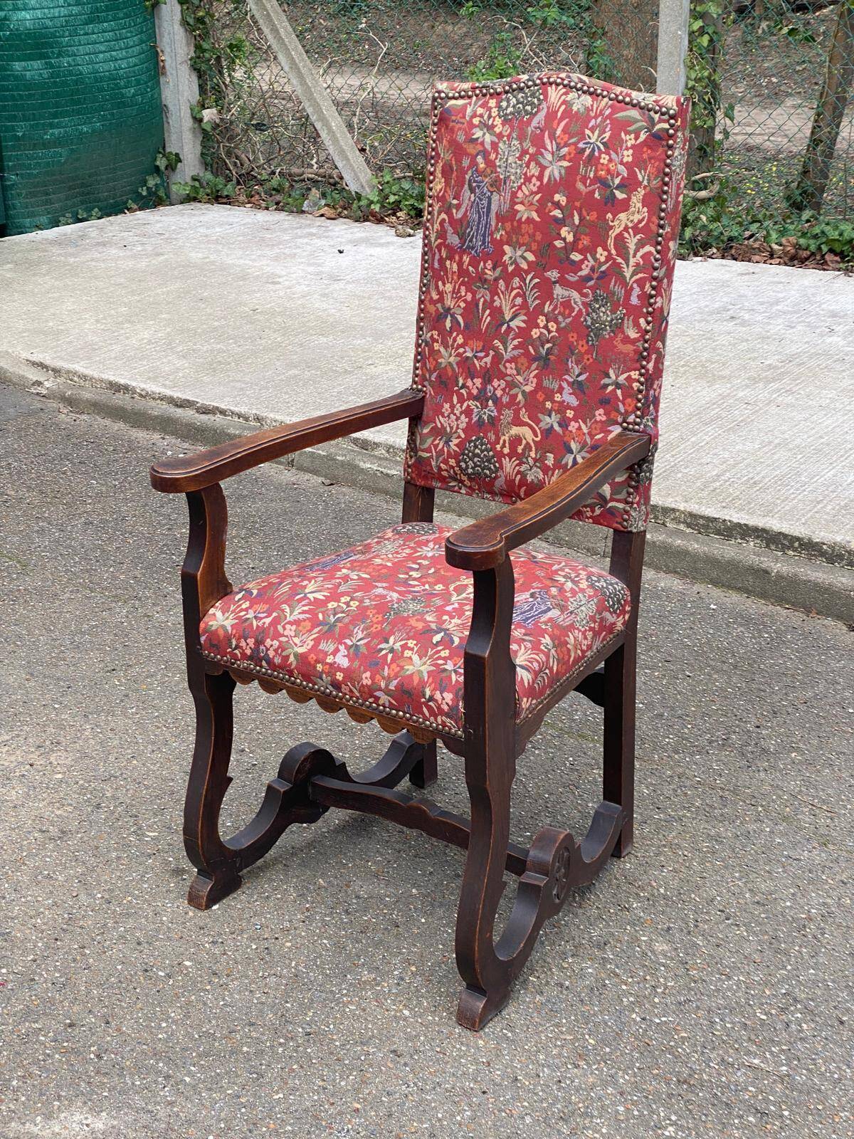 Henri II armchair in solid wood and floral burgundy fabric, 19th century.