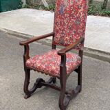 Henri II armchair in solid wood and floral burgundy fabric, 19th century.