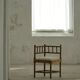 Antique French corner chair handcrafted with lamb's wool, early 20th century.