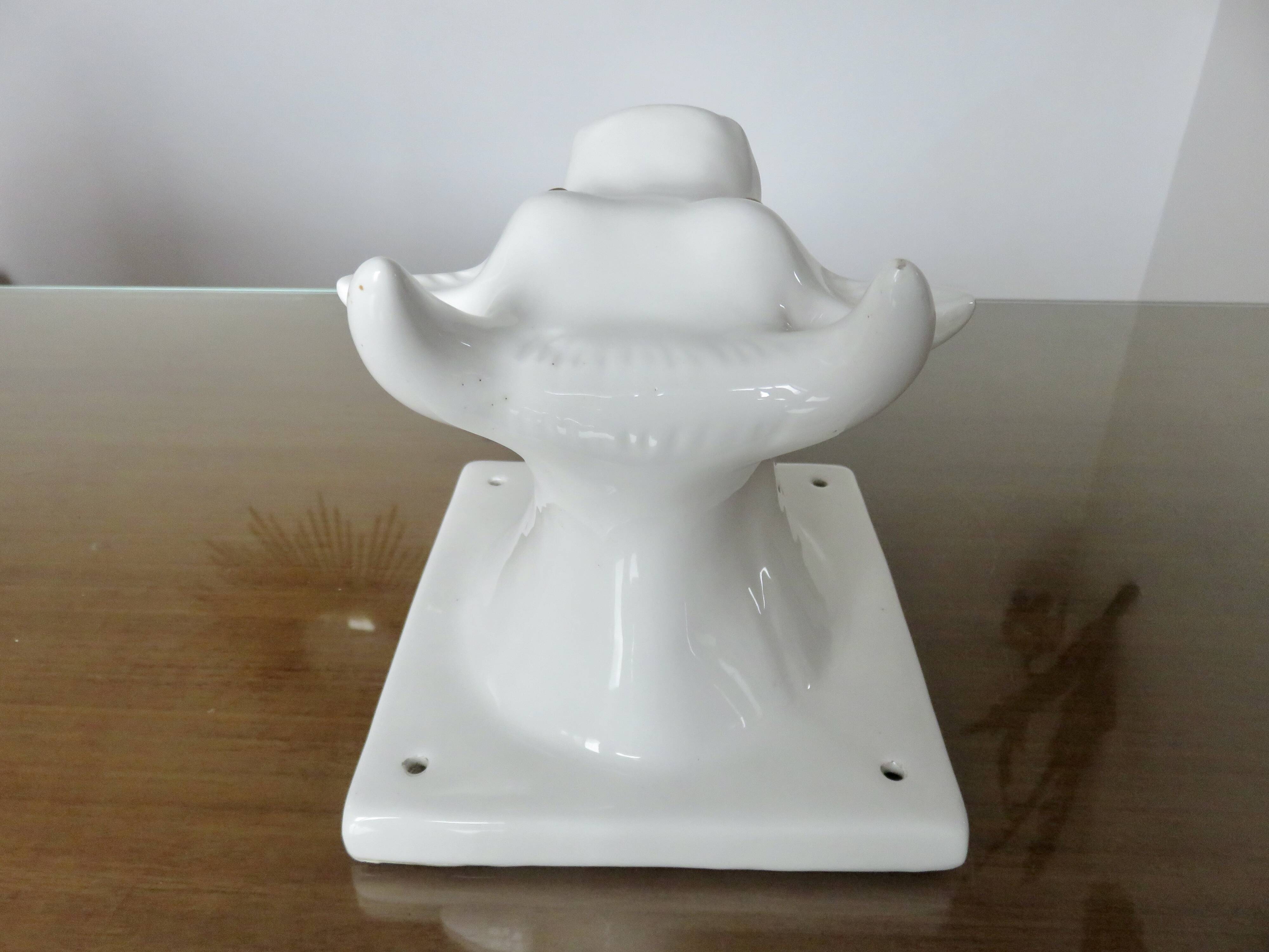 Stylized cow head in white ceramic, wall decoration from the 80s