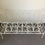 White wrought iron folding bed