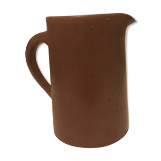 Small pitcher in patinated sandstone