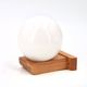 Wall light in pine wood with opaque white glass globe, 1980s