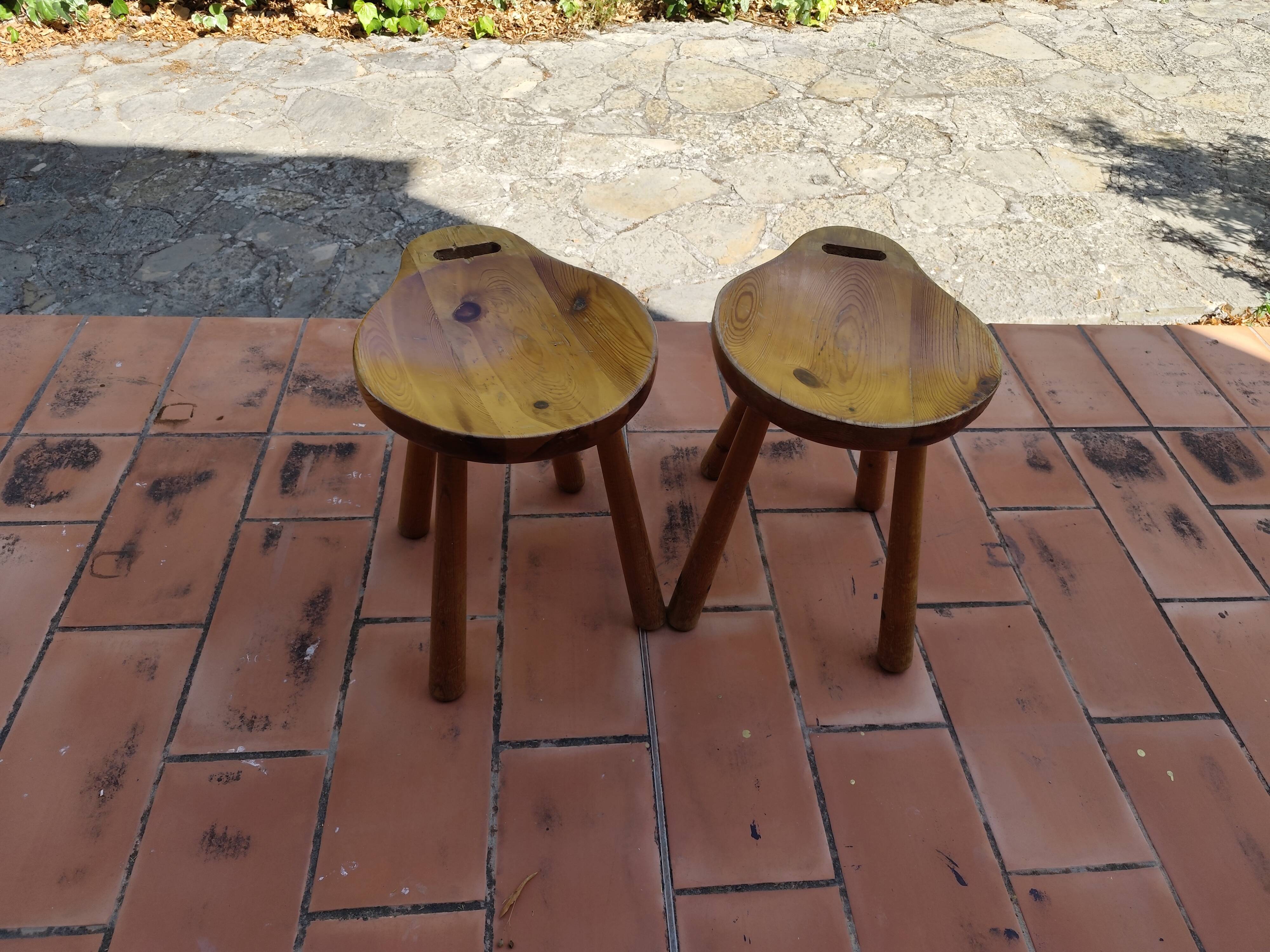 Pair of vintage 1960s solid pine ovoid Scandinavian stools