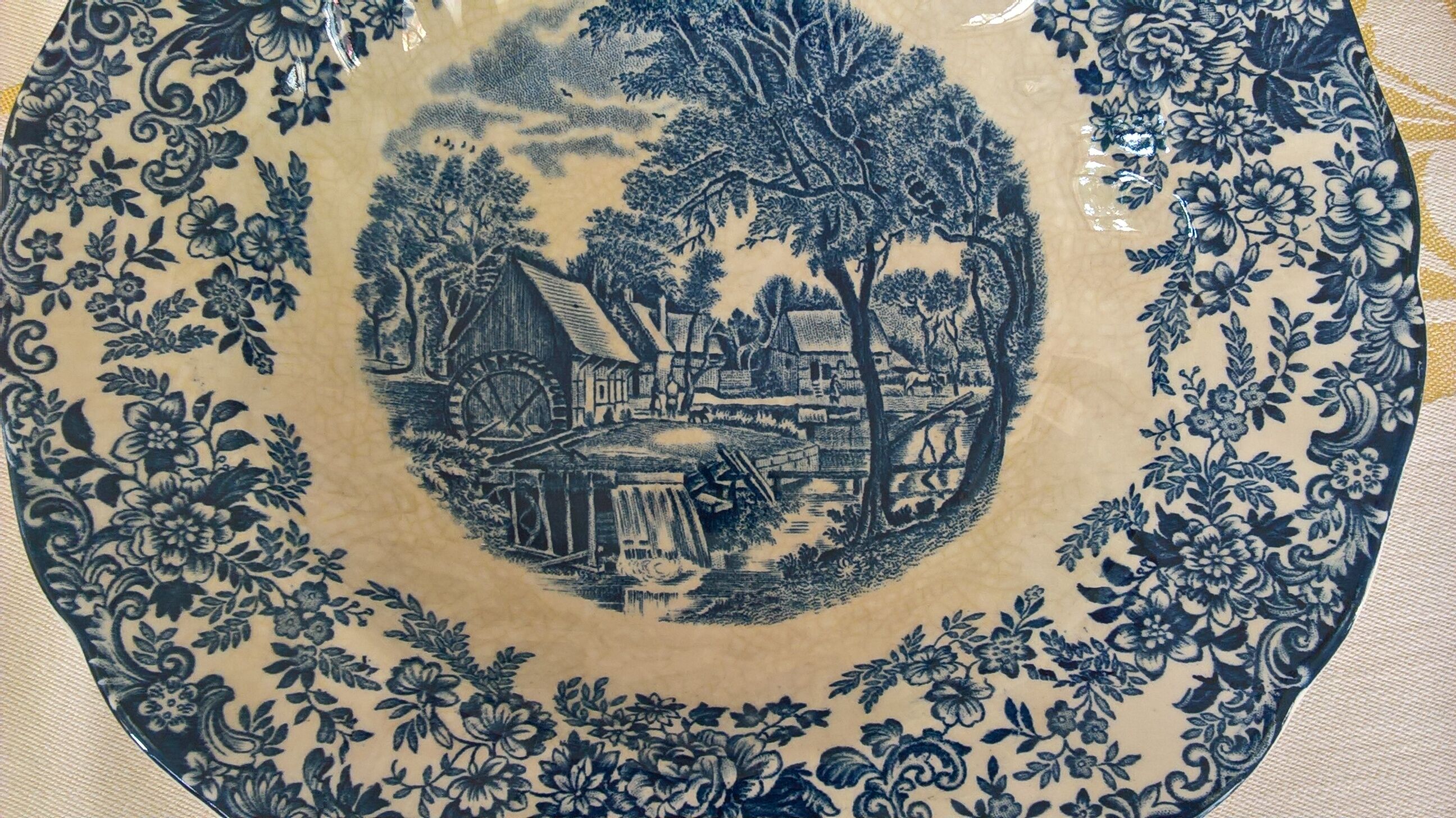 Eight English hollow plates Johnson Bros "Mill Stream"