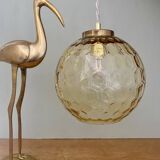 Vintage globe pendant light in amber glass