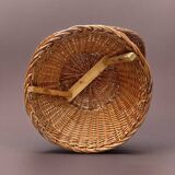 Vintage woven wicker armchair