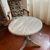 Patinated wooden pedestal table