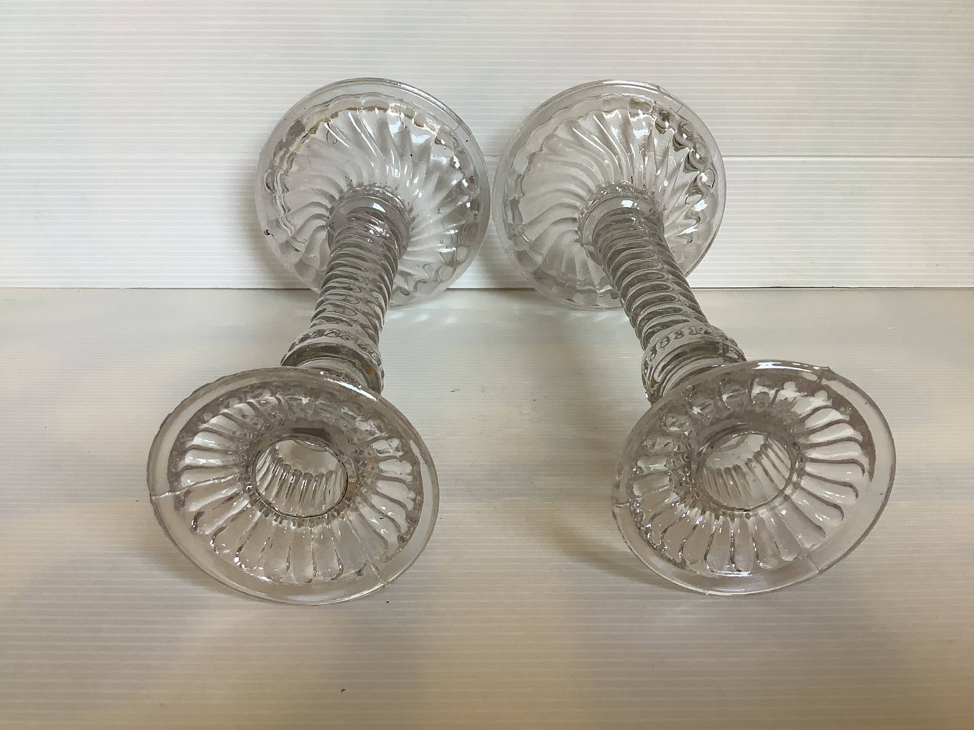 Pair of old molded glass candlesticks