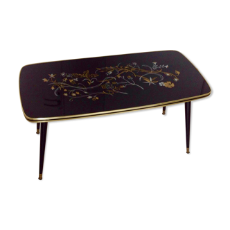 Coffee table, year 60, black with floral patterns