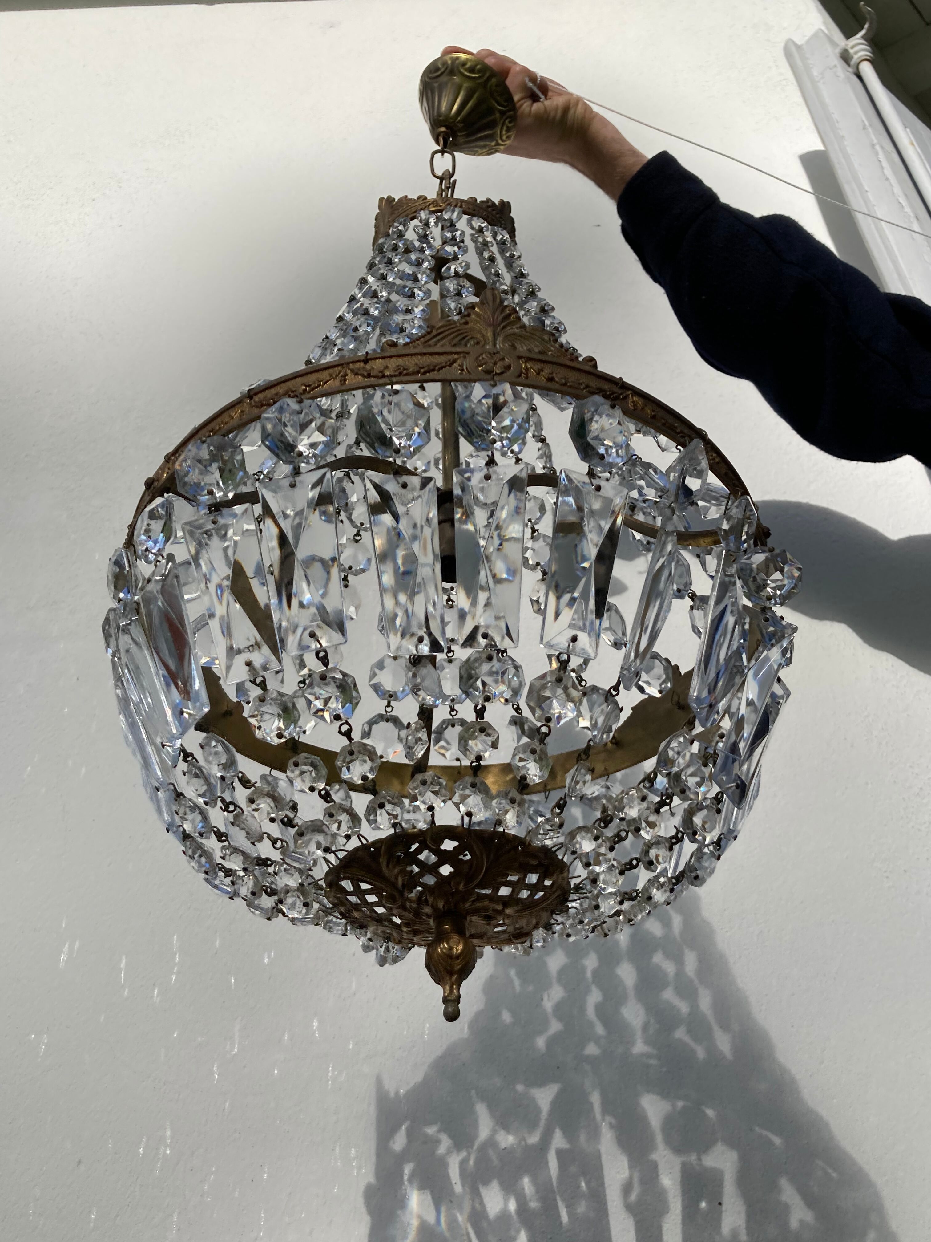 Balloon chandelier with glass crystal and brass tassels in empire style