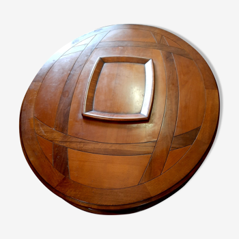 Oval wood coffee table with internal bar