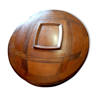 Oval wood coffee table with internal bar
