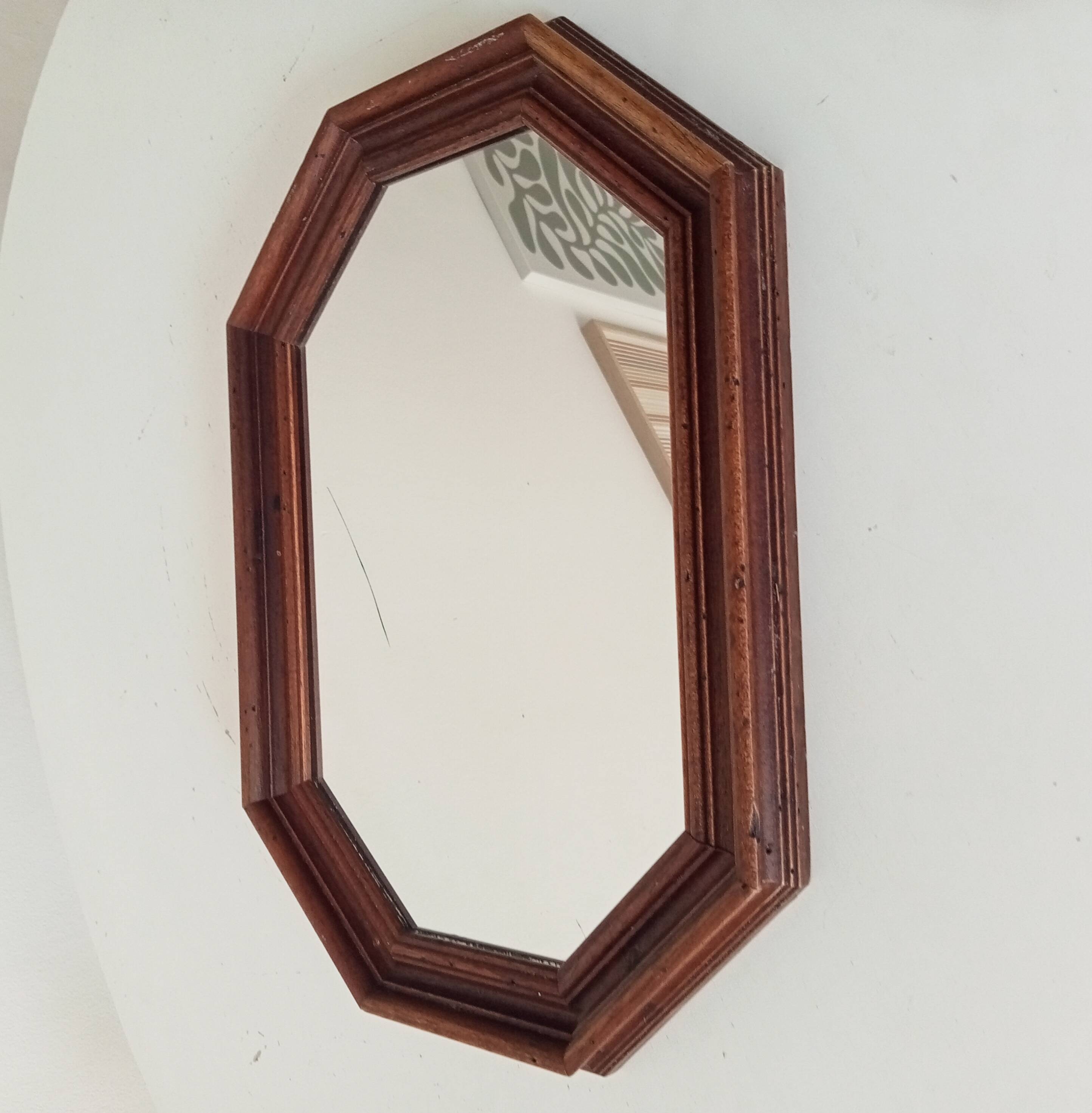 Vintage octagonal mirror from the 1960s.