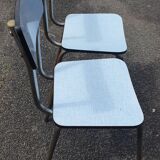 2 sky blue Formica chairs