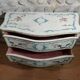 Commode italienne deux tiroirs décor sur fond beige