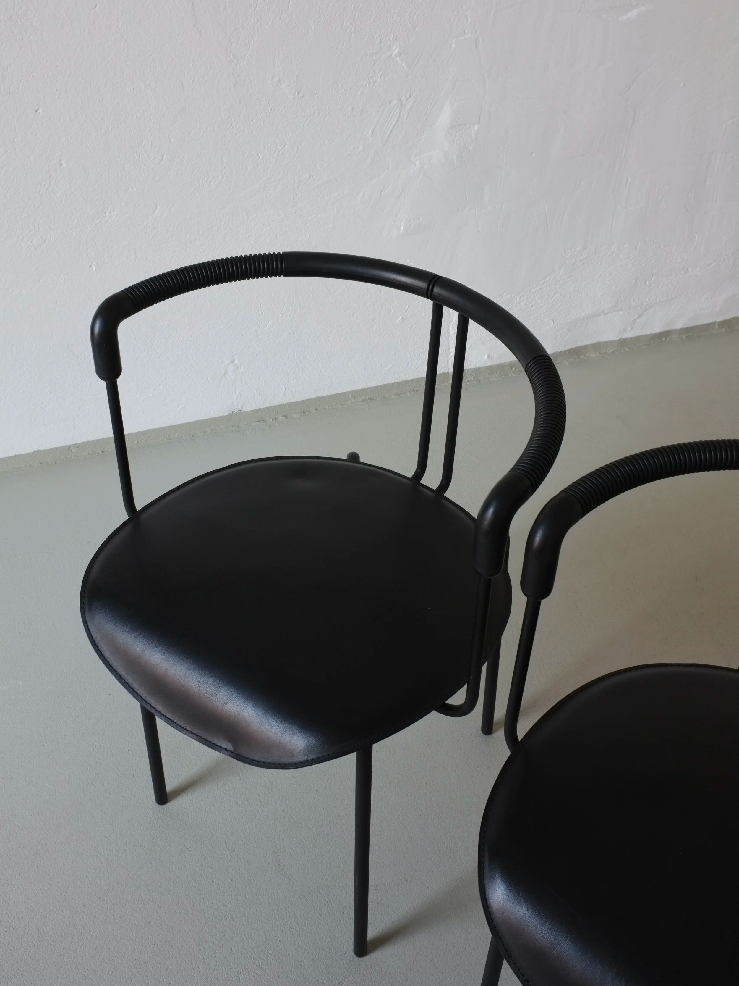 4 postmodern black leather armchairs from Cidue, Italy, 1990s