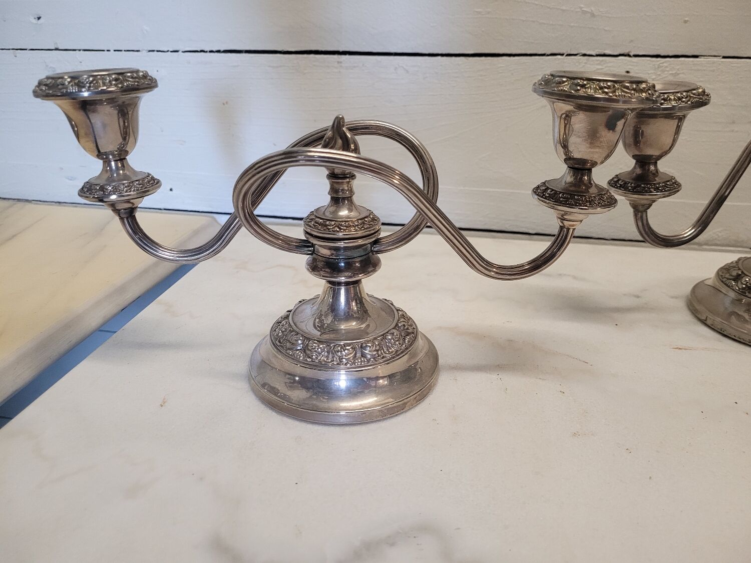 Pair of silver metal candlesticks