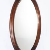Oval mirror with wooden frame