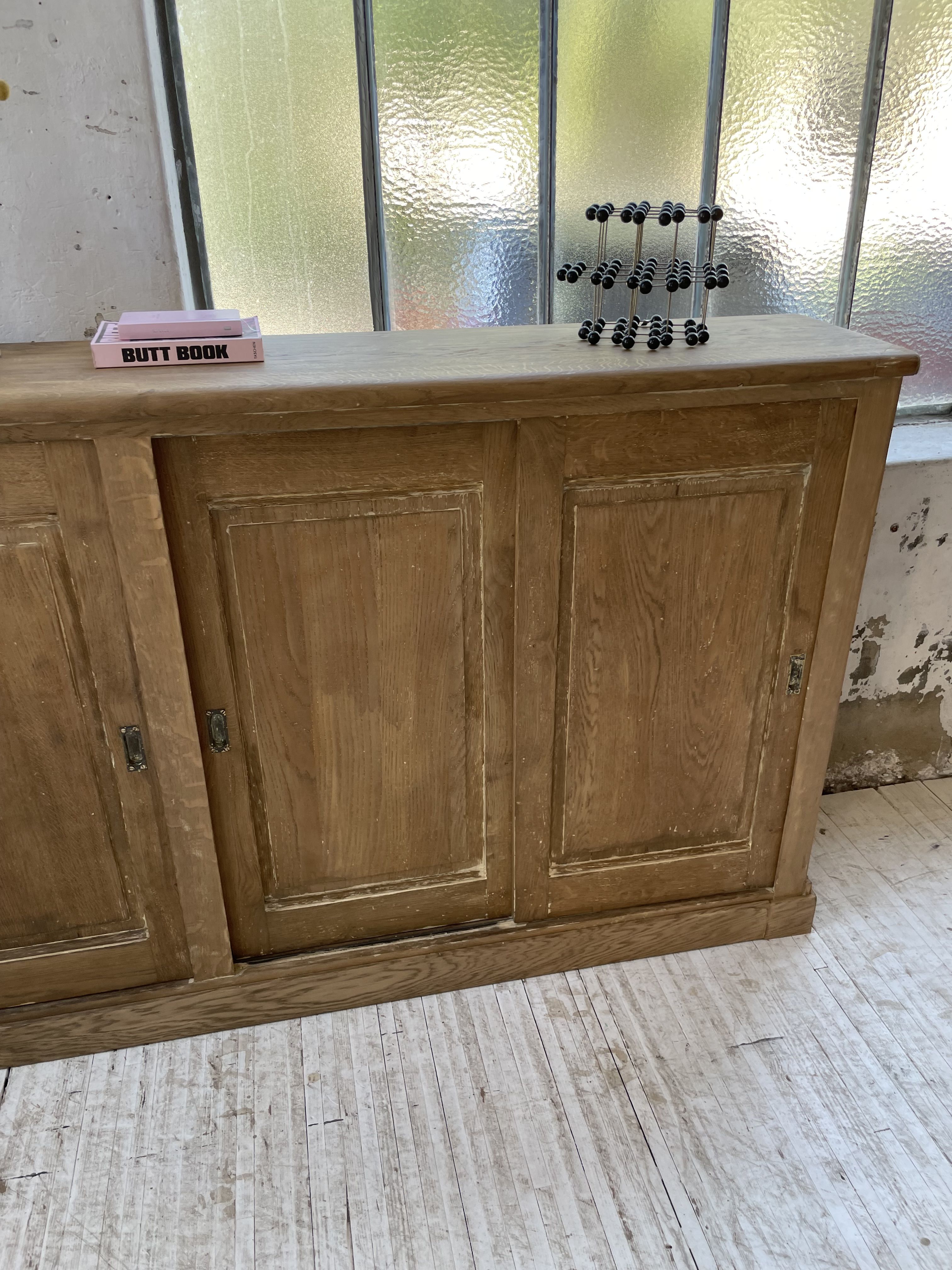 Large row of solid oak loom sliding doors