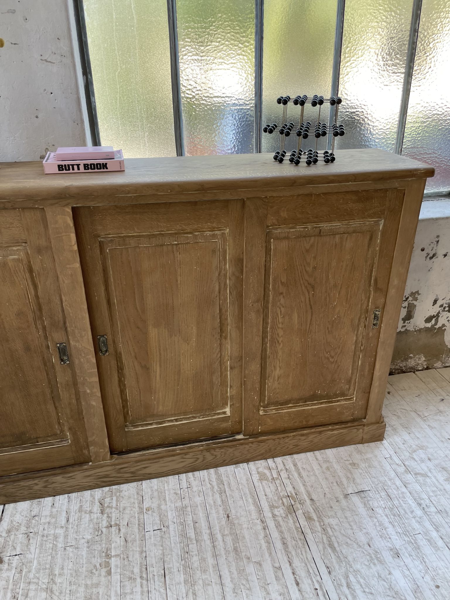 Large row of solid oak loom sliding doors