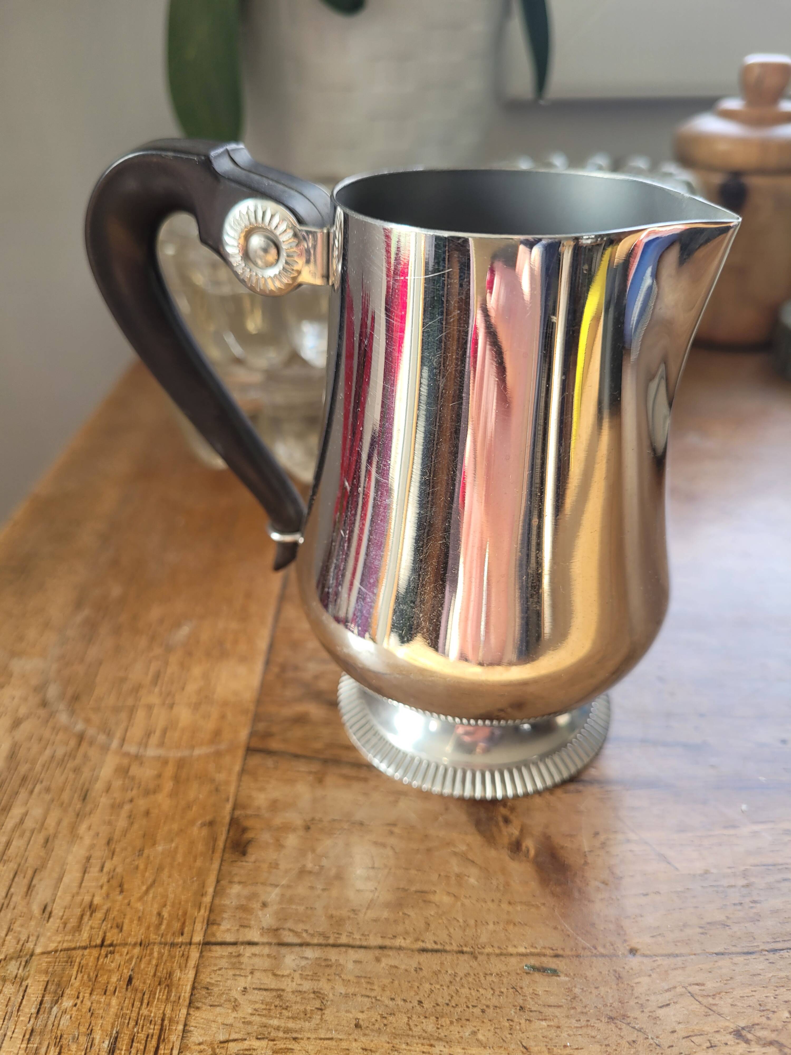 Vintage stainless steel milk jug