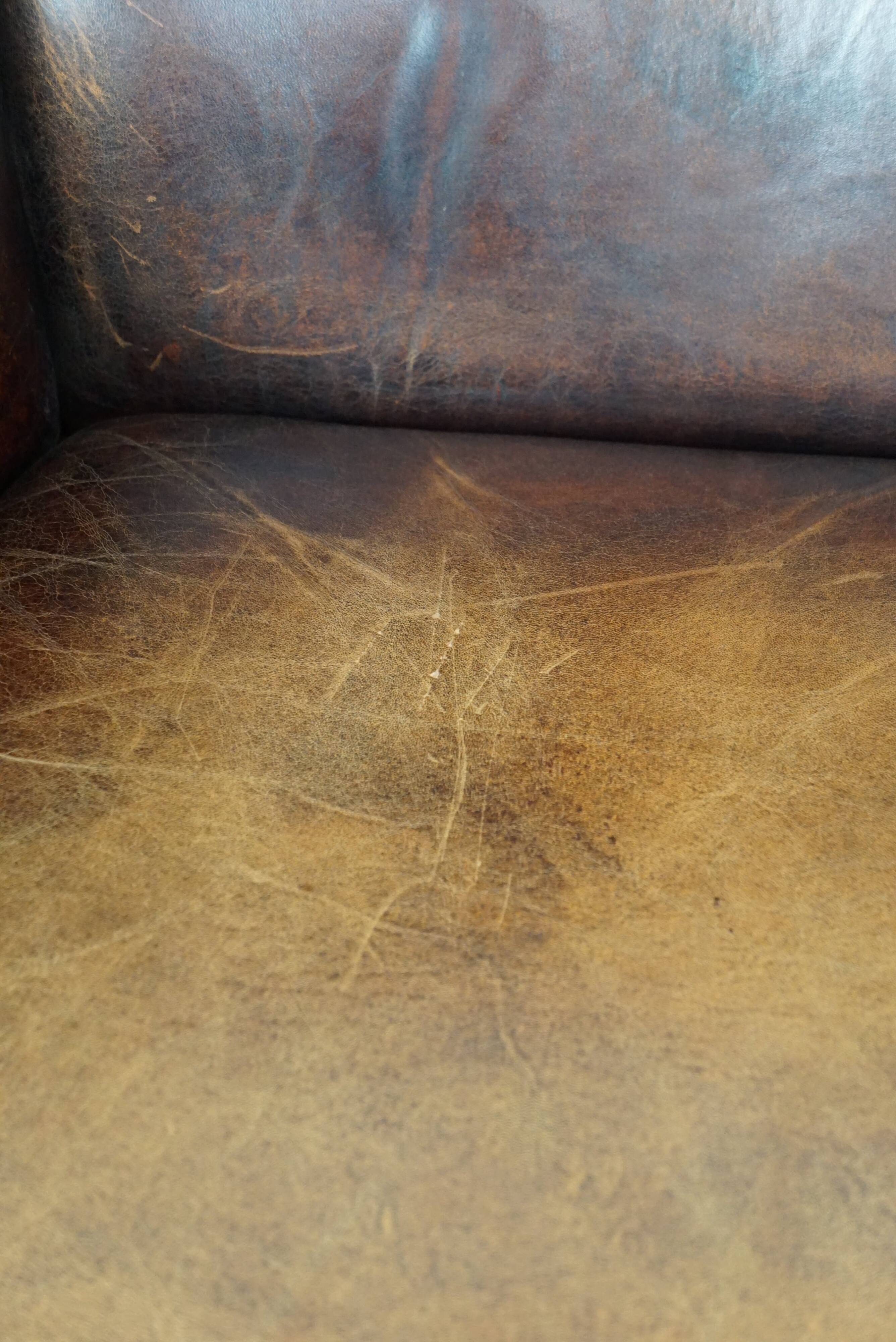 large wingback chair made of sheepskin leather with uniquely beautiful colors