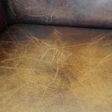 large wingback chair made of sheepskin leather with uniquely beautiful colors