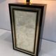 Large lamp in black lacquered wood, gilding and mother-of-pearl. French work. Circa 1970