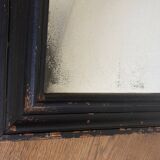 19th century blackened mirror with pitted glass 34cm x 40cm