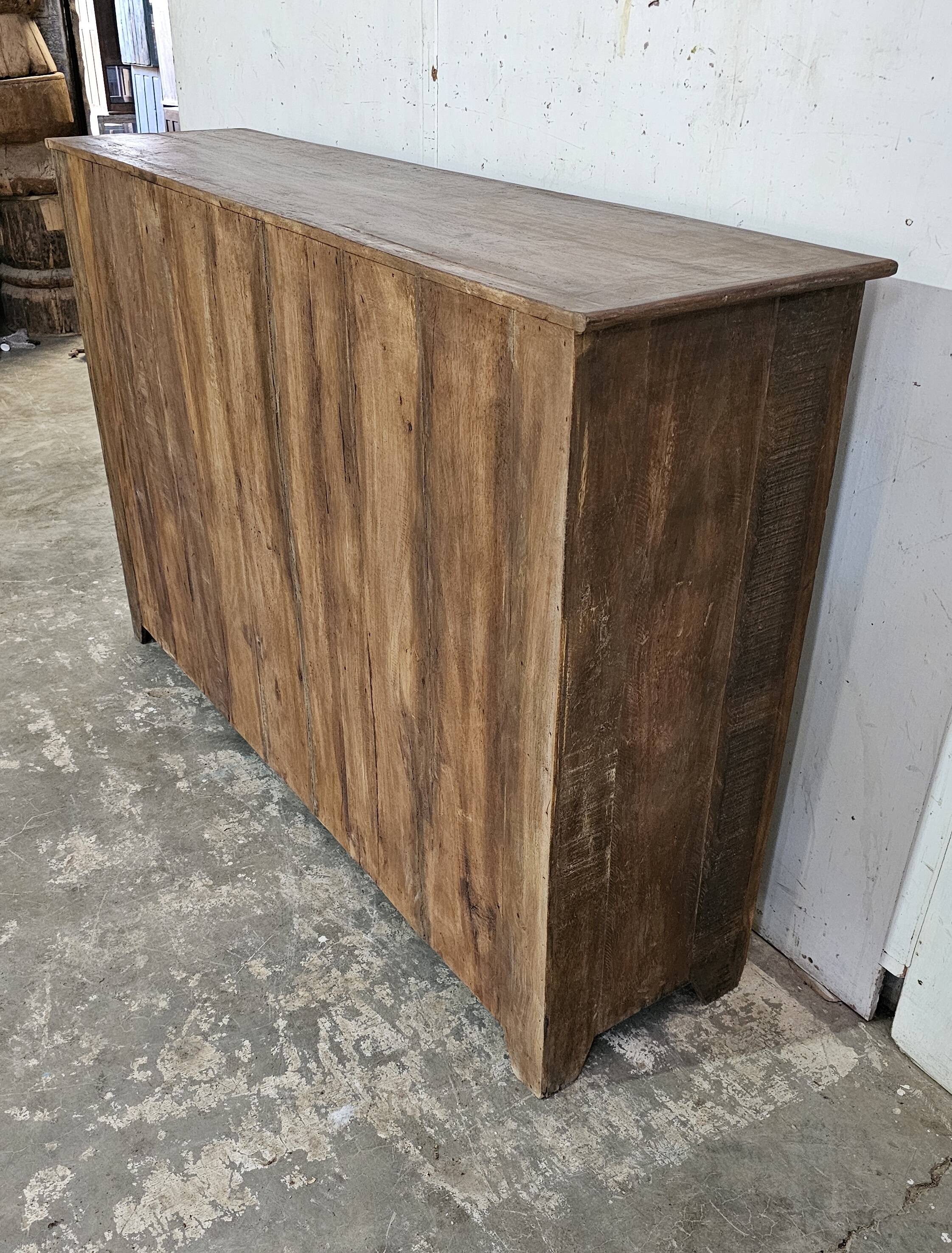Antique glass-fronted buffet in Burmese teak