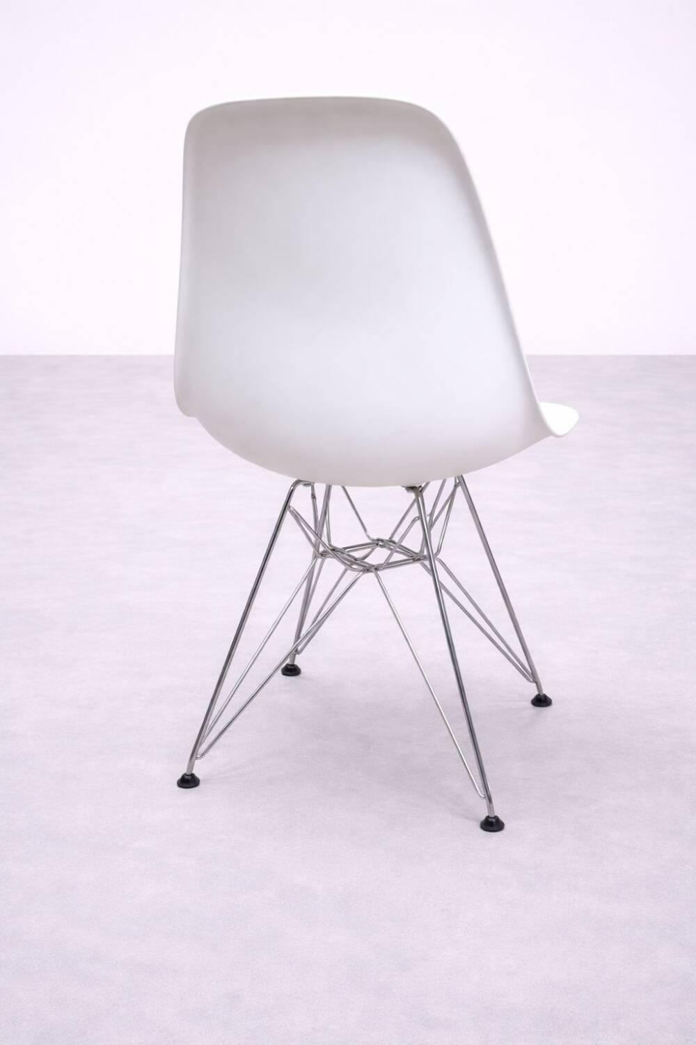 White DSR style Eames chair by Vitra with chrome Eiffel base.