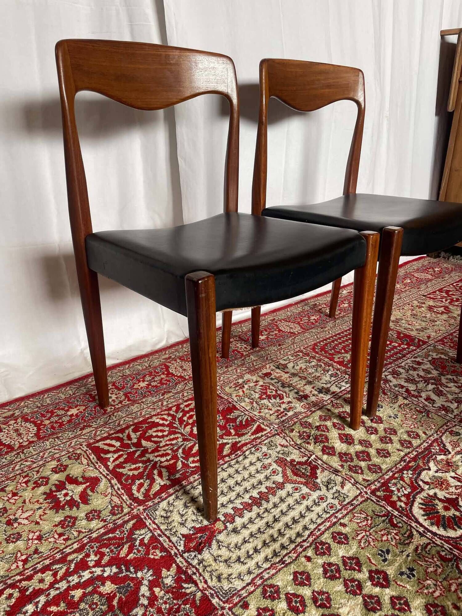 Pair of vintage teak chairs with black faux leather – Scandinavian style