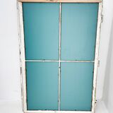 Vintage wooden window converted to a mirror