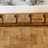 Wall mounted wooden coat rack turned