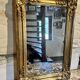 Miroir Louis XV, glace au mercure et bois doré, XIXe