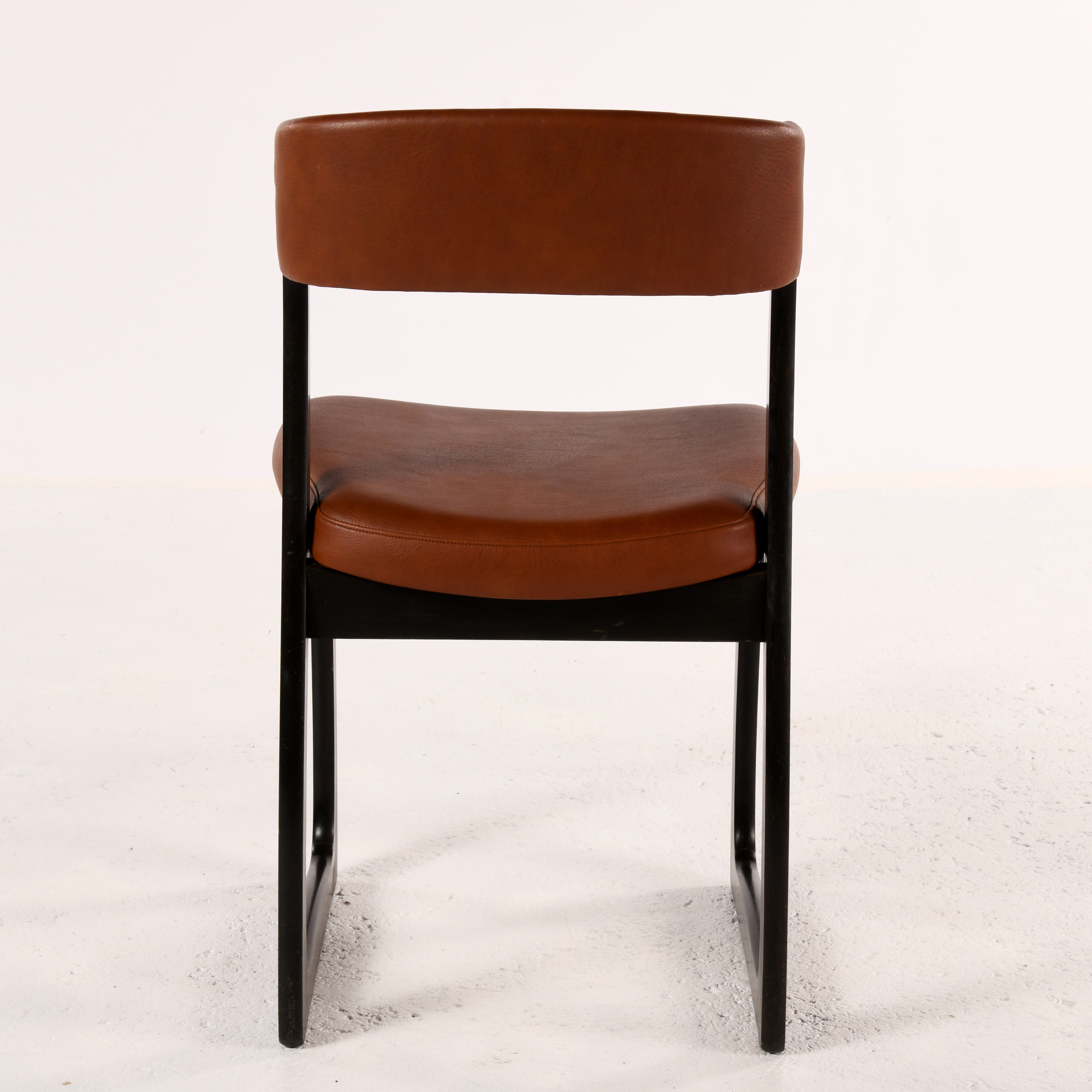 Set of 4 vintage wood and skai sled chairs