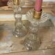 Paire de bougeoirs en verre flacons roger gallet