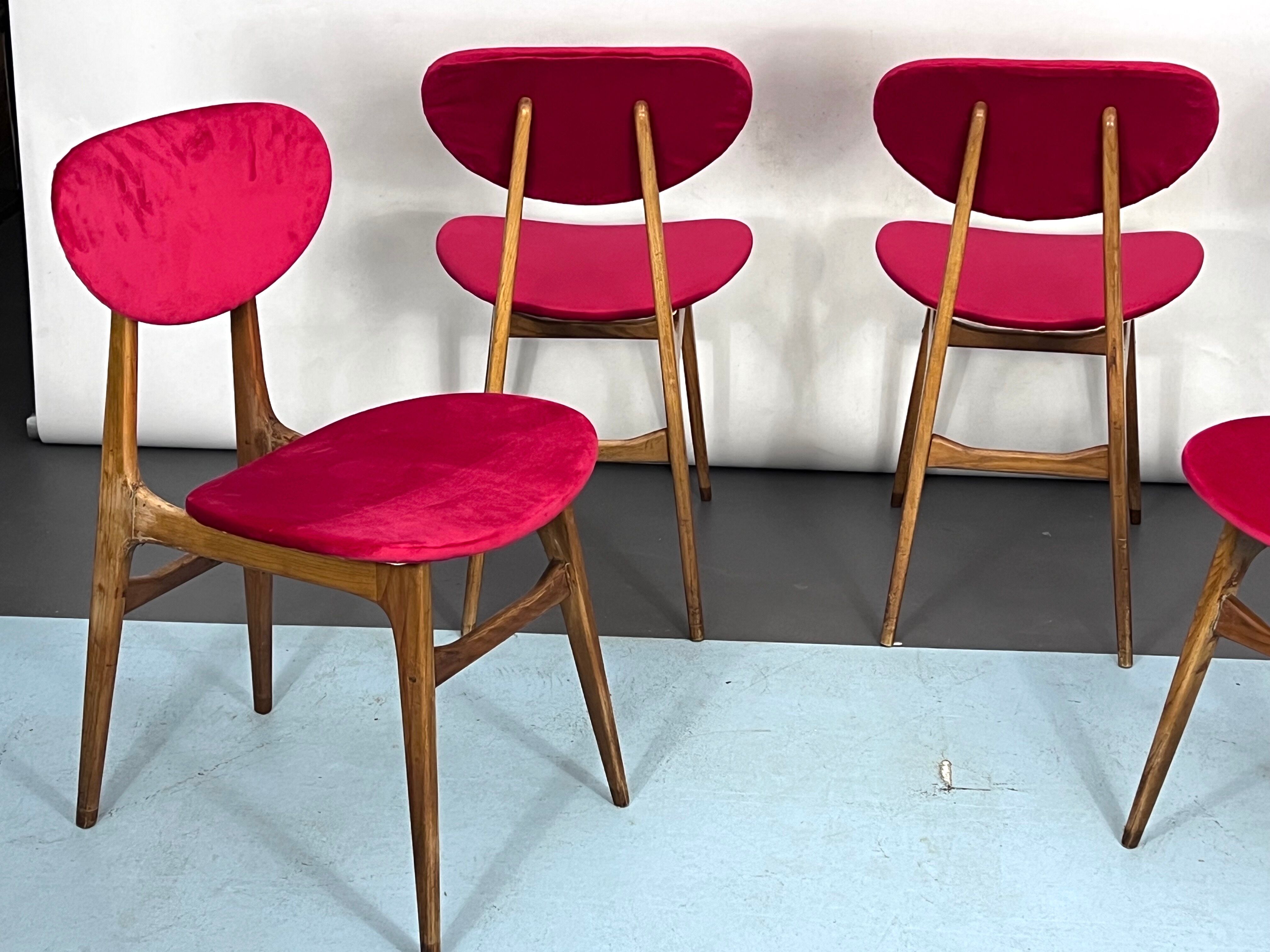 Set of four red velvet and wood dining chairs, Italy 1950