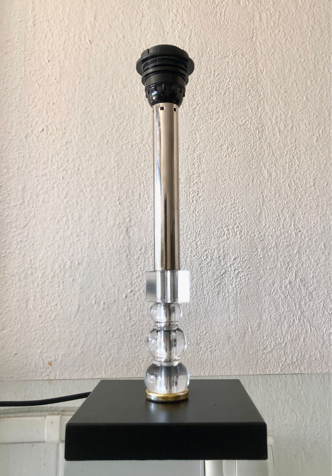 Silver-plated metal lamp base with crystal.