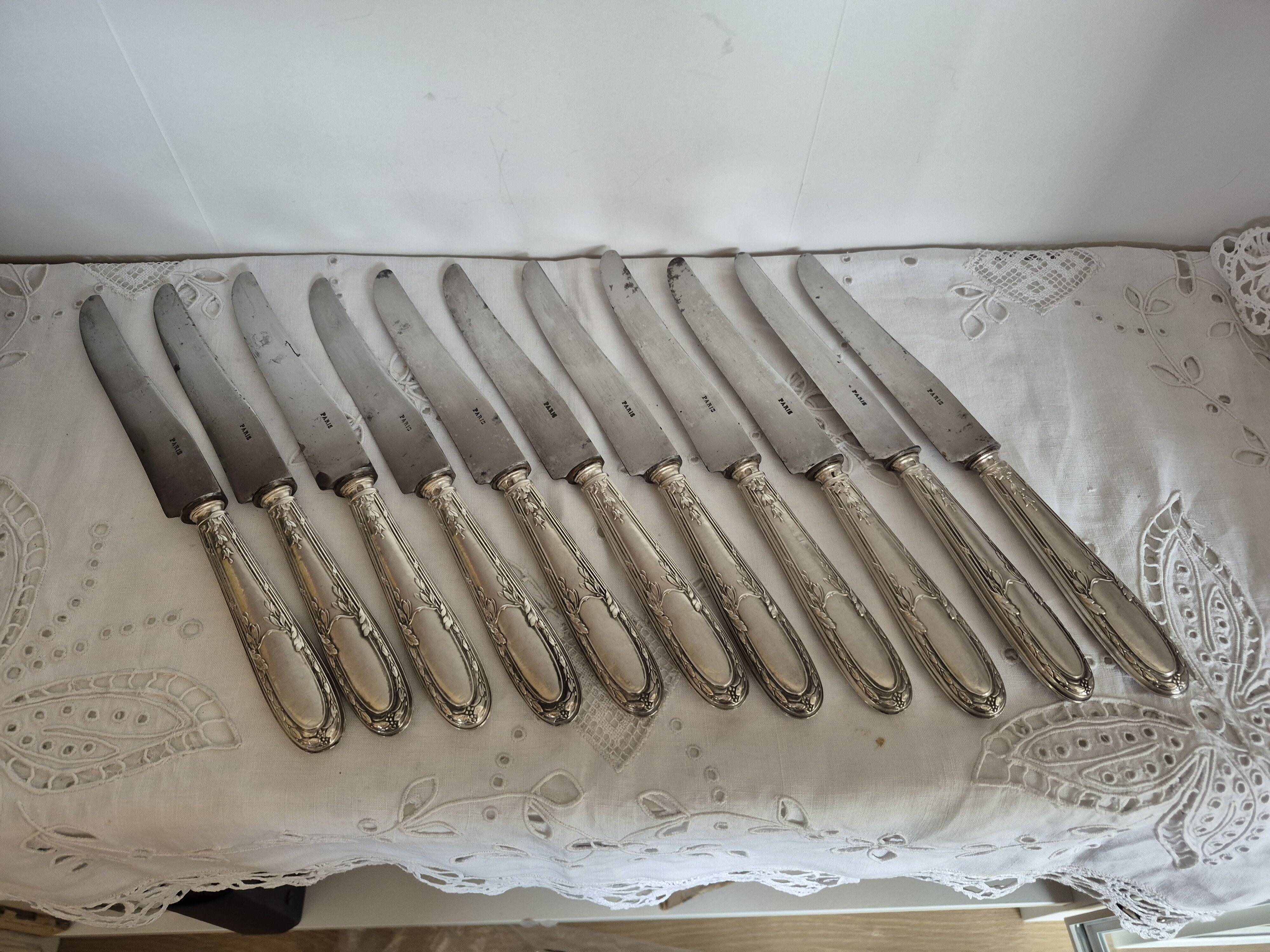 Set of 11 vintage knives, steel blades and silver handles