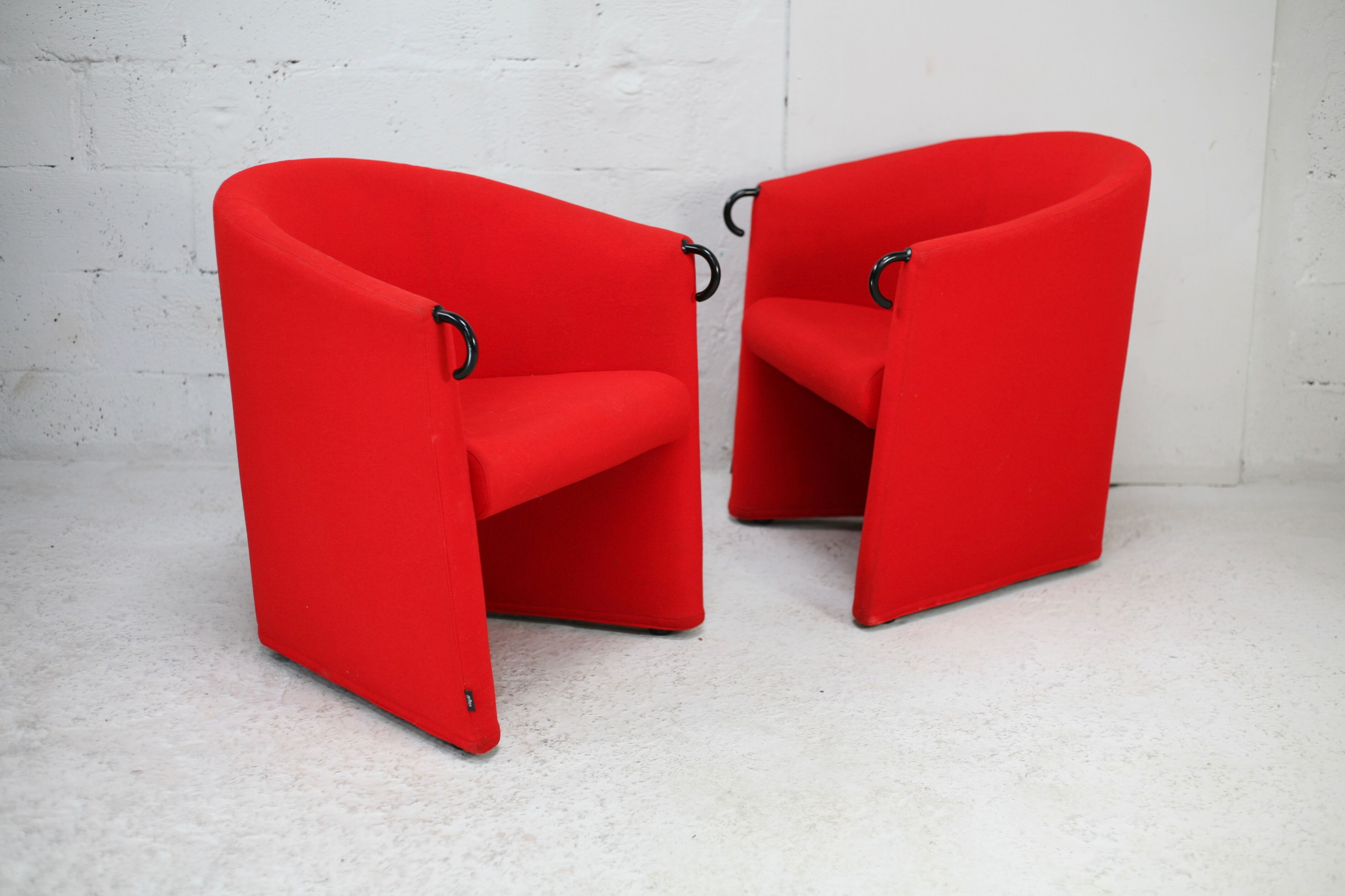 Pair of red Arflex armchairs. Italy, circa 1980