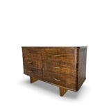 A vintage Italian chest of drawers, made of veneered walnut and solid wood,