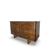 A vintage Italian chest of drawers, made of veneered walnut and solid wood,