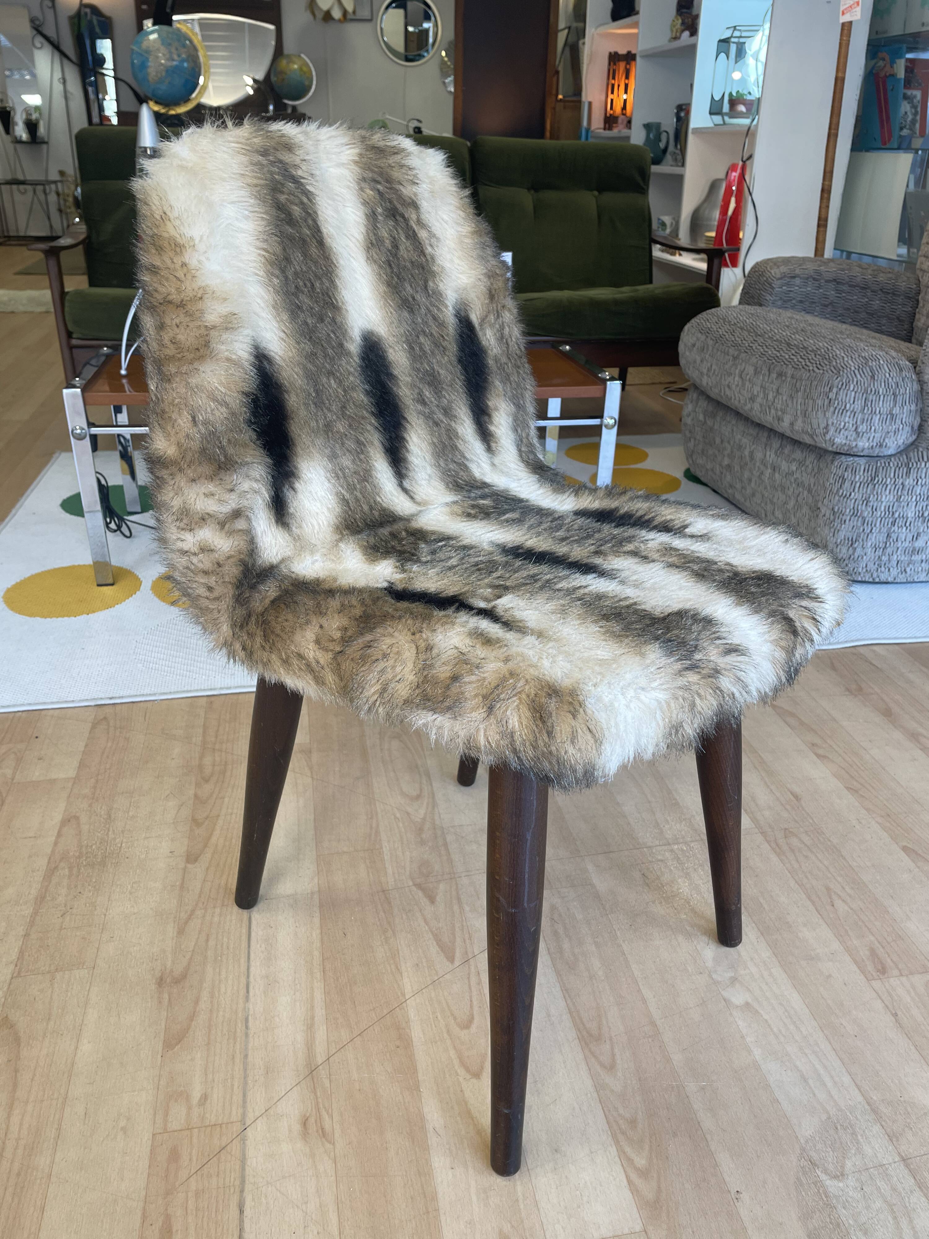 Faux fur chair with patterns & tapered dark wood legs