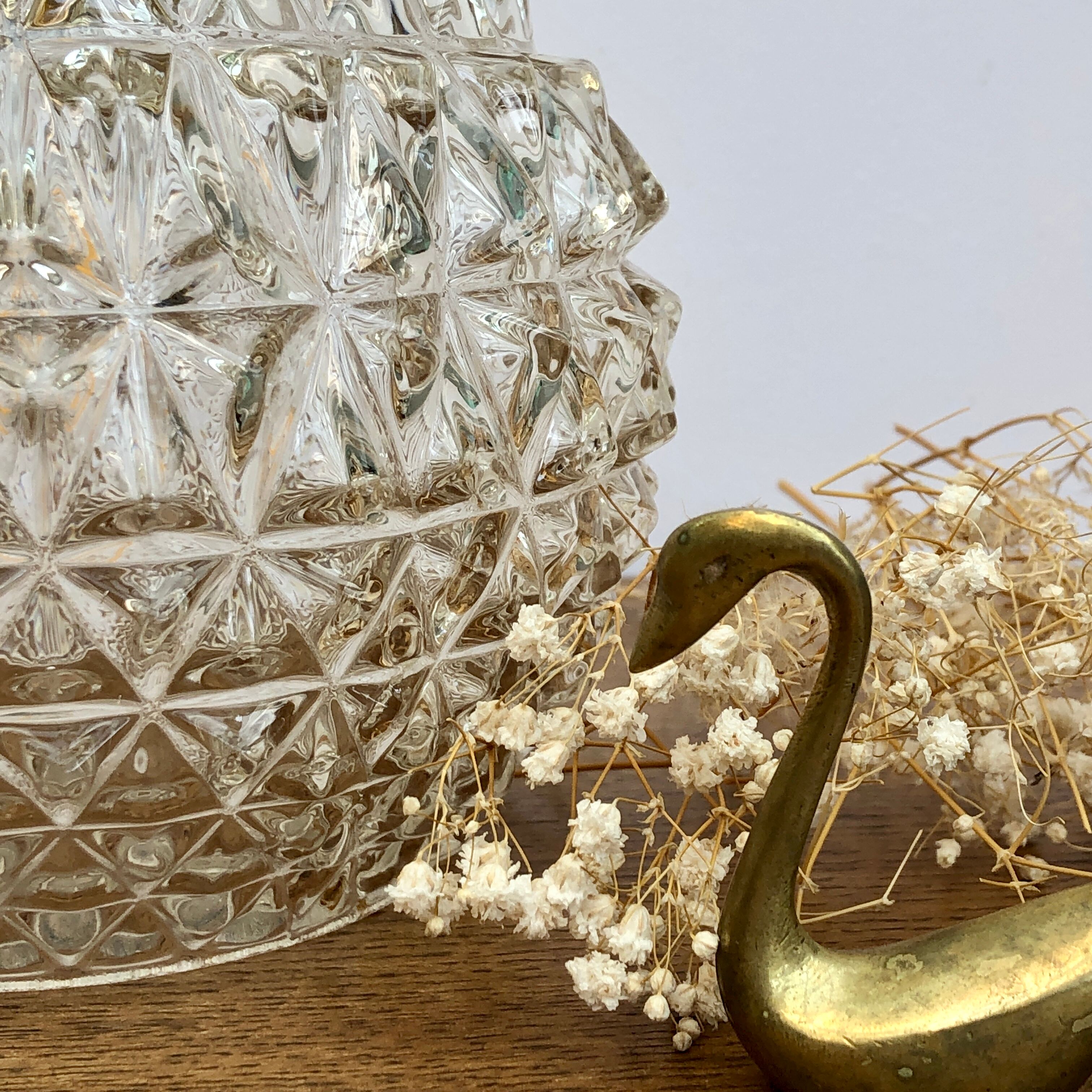 Vintage globe stroller in moulded glass