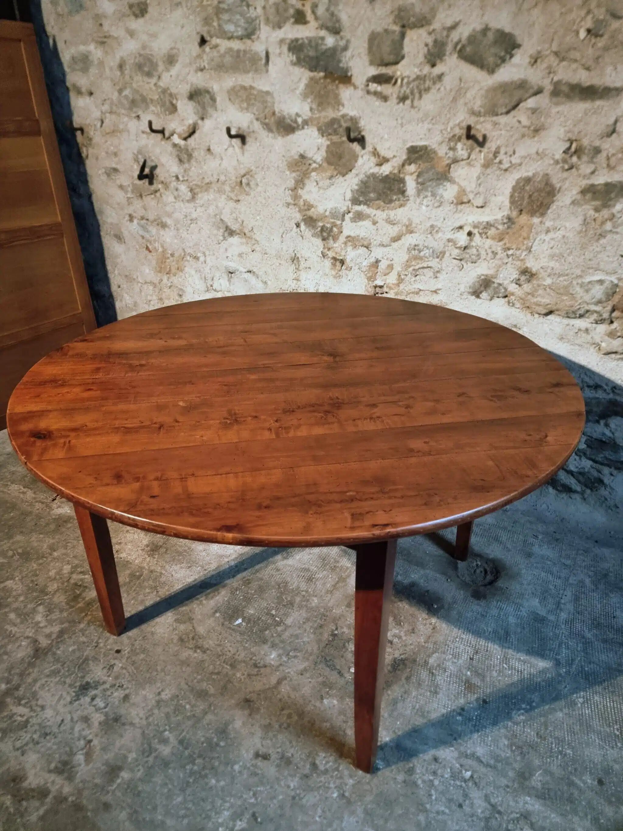 Vintage French round dining table in cherry wood, circa 1920.